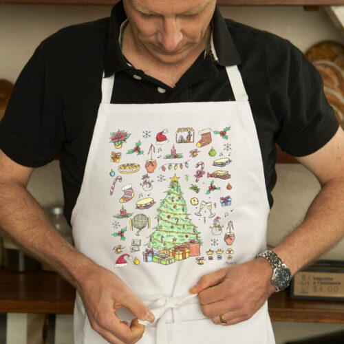 Delantal con un diseño artesanal dedicado a la Navidad.