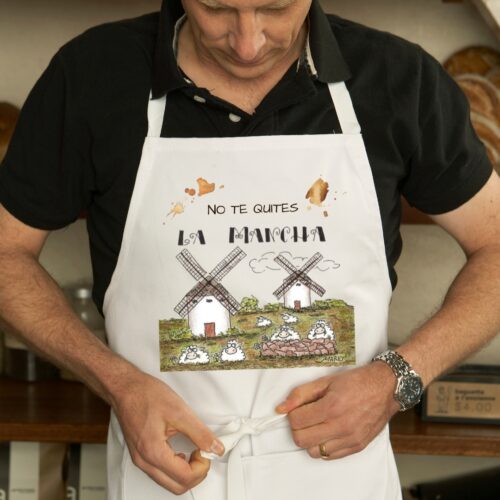 Delantal con un diseño artesanal dedicado a La Mancha, con un toque de humor.