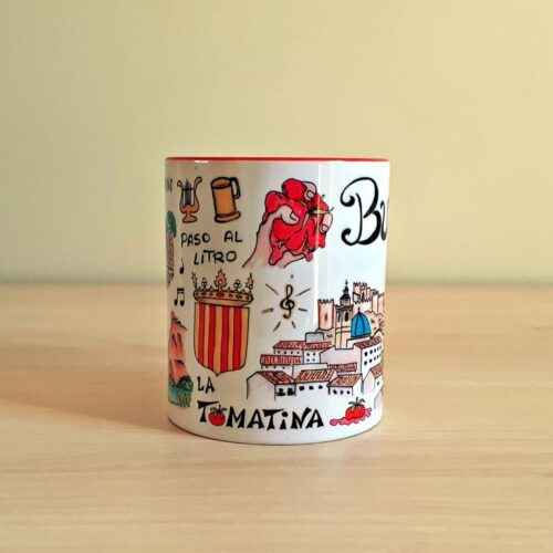 Taza de cerámica de colores con una ilustración artesanal dedicada a Buñol vista lateral.