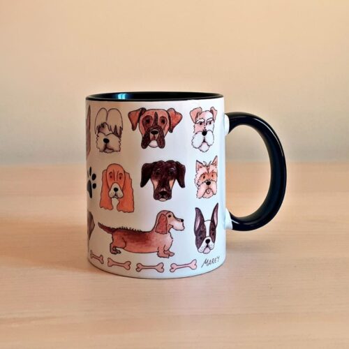 Taza de cerámica de colores con una ilustración artesanal dedicada a los perros