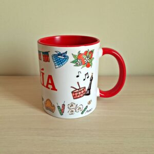 Taza de cerámica de colores con una ilustración artesanal dedicada a las Fallas de Valencia.